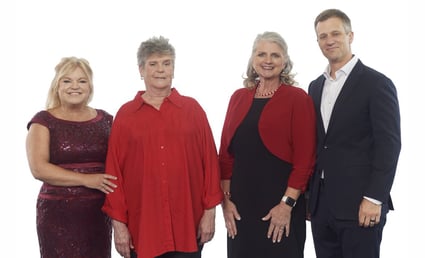 BAYADA CNA Hero of the year Paula Candler stands with David Baiada, presenter Lisa Boland, and Linda Siessel to celebrate her recognition