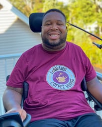 Eric LeGrand wearing a LeGrand Coffee House t-shirt