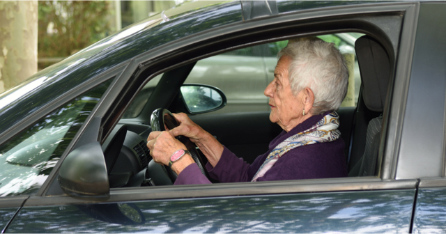 Elderly woman driving